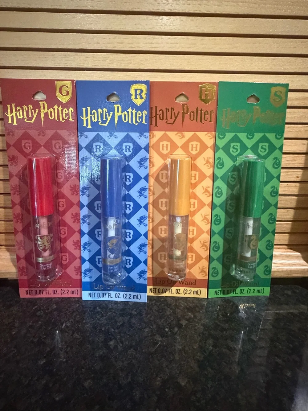 Warner Bros. Harry Potter Lip Oil Set — Red, Blue, Orange & Green Wands